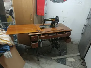 Maquina de coser singer ingles
