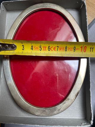 Portafotos ovalado de plata