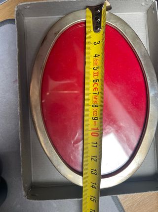 Portafotos ovalado de plata