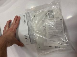 Caja vacía PlayStation3 con instrucciones