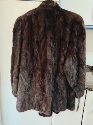 Chaquetón corto de piel natural ,de peleteria