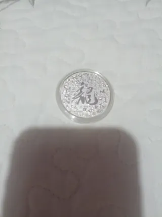 Moneda china con Baño de Plata