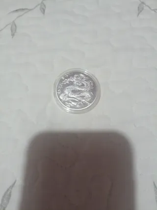 Moneda china con Baño de Plata