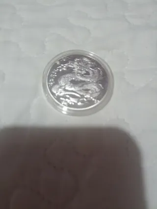 Moneda china con Baño de Plata