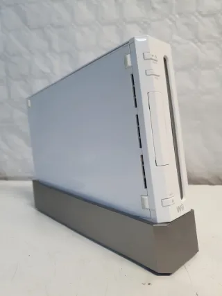 Consola Nintendo wii+accesorios y sin mando.