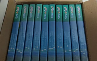 Caja de 10 DVDs interactivos inglés Tommy & Oscar