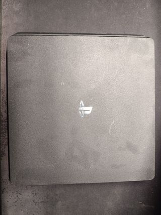 PS4 Slim 1TB con mando, funda de mando y soporte