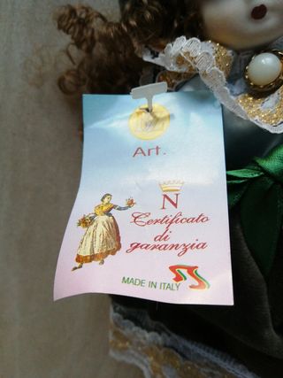 Bambola in ceramica da collezione green porcellana