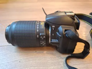 Nikon D3100 cámara reflex + objetivo 55-200