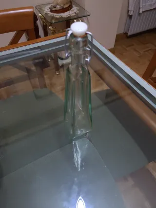 Botella cristal con luz de hadas