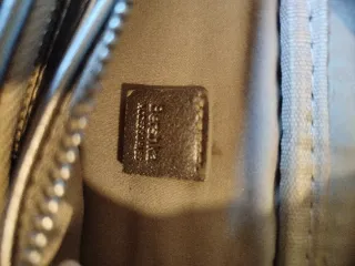 Riñonera Bershka plateada