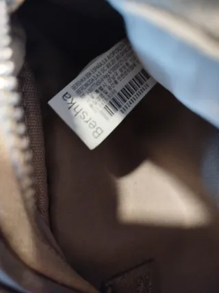 Riñonera Bershka plateada