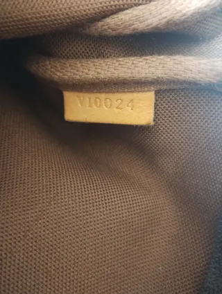 Pochette Louise Vuitton