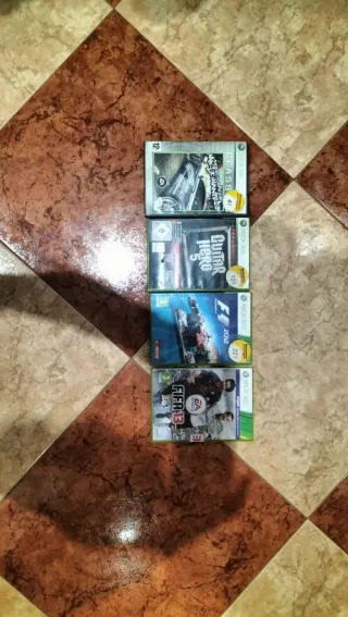 Juegos Xbox 360: F1 2012, Guitar Hero 5, FIFA 13