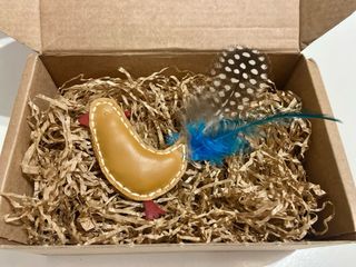 Caja de juguetes artesanales para gato