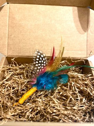 Caja de juguetes artesanales para gato