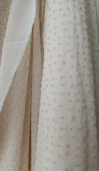 Tejido crep con perlitas