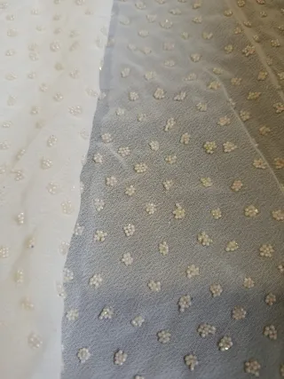 Tejido crep con perlitas