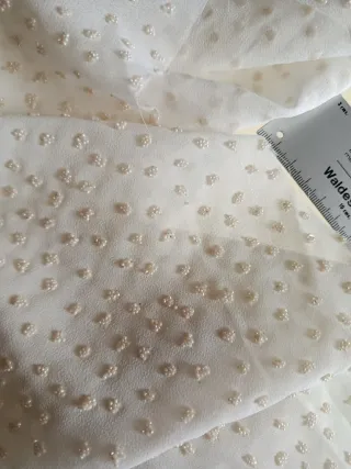 Tejido crep con perlitas