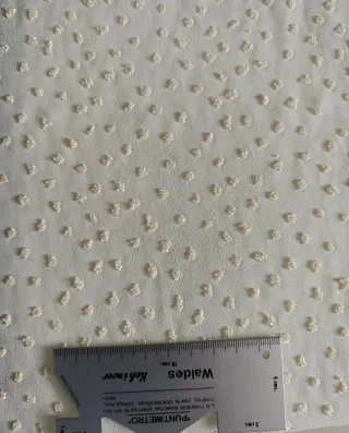 Tejido crep con perlitas