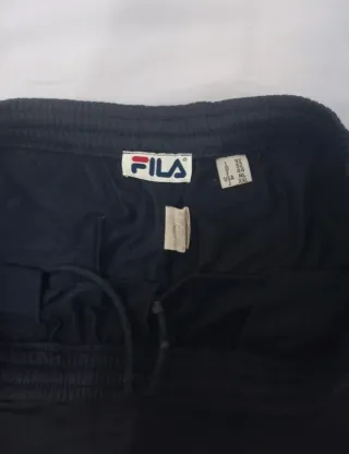 Pantaloni tuta Fila blu marino con bande verdi