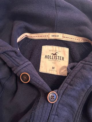 Sudadera con capucha Hollister azul marino.