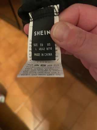 Maglione donna nero con scollo incrociato