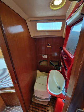 Dufour 31 timón de rueda con Dingui y Fueraborda