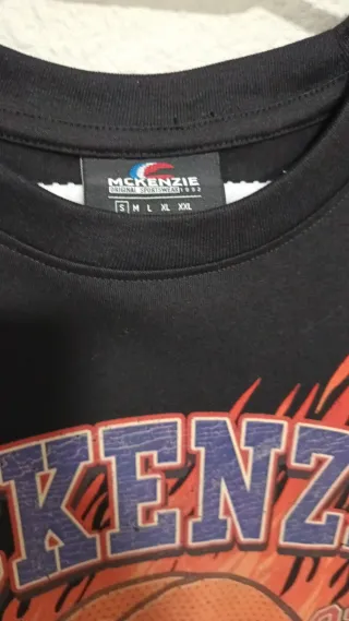 Camiseta McKenzie Negra Baloncesto Champions nueva