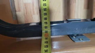 Cama con colchón de madera y metal