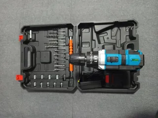 Taladro percutor con maletín y accesorios