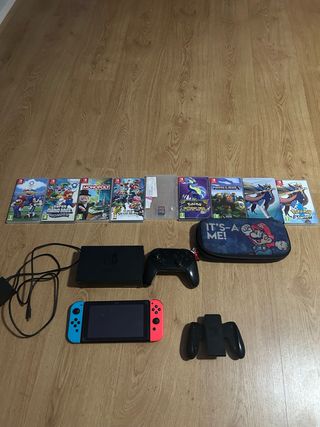 NINTENDO SWITCH + 8 JUEGOS + ACCESORIOS