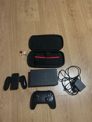 NINTENDO SWITCH + 8 JUEGOS + ACCESORIOS