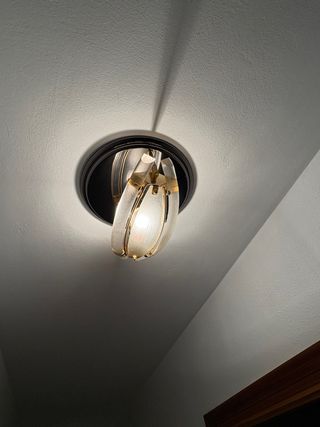 Lámpara de techo moderna dorada y transparente