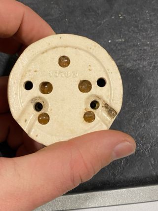 Interruptor inglés latón y porcelana