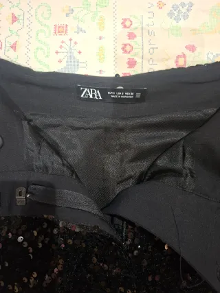 Pantalón corto lentejuelas negro