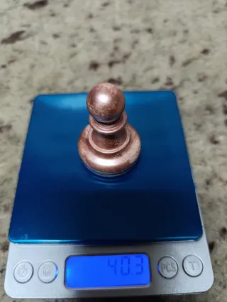 Pieza de ajedrez de cobre