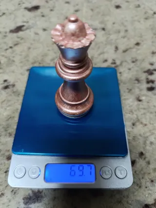 Pieza de ajedrez de cobre