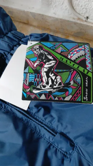 Mono de nieve infantil azul