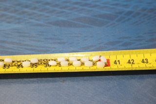 Rosario pequeño, infantil con cuentas blancas ¿nácar?