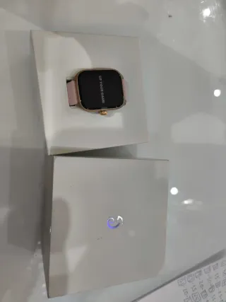 Reloj SMARTWATCH oro y rosa