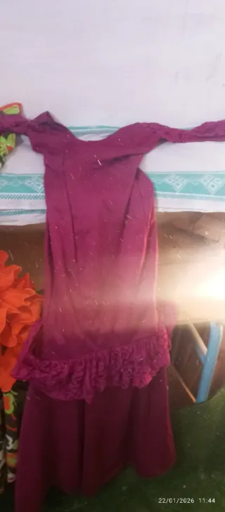 Traje de flamenca rosa y morado