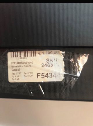 Stivaletti Gucci neri con fibbia oro