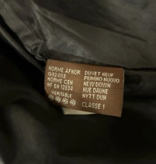 Piumino Moncler testa di moro