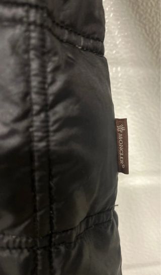 Piumino Moncler testa di moro