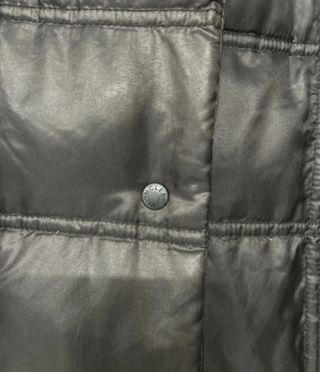 Piumino Moncler testa di moro