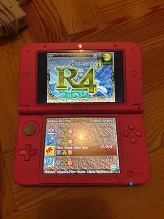 Nintendo 3DS XL Rosa + cargador y juegos