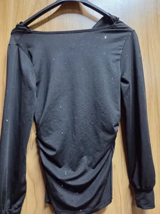 Maglione nero con paillettes