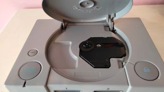 Playstation 1, chip, con caja