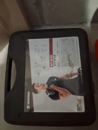 Pesas nuevas en maletín